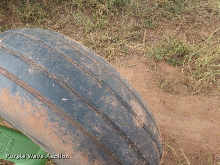 image for item DE6472 2009 John Deere 4995 windrower