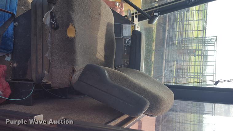 image for item EN9627 1996 New Holland 2450 windrower