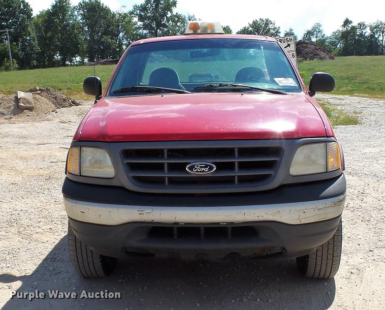 image for item DD7412 2000 Ford F150 flatbed pickup truck