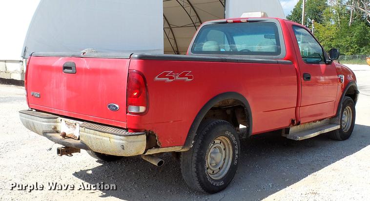 image for item DD7412 2000 Ford F150 flatbed pickup truck