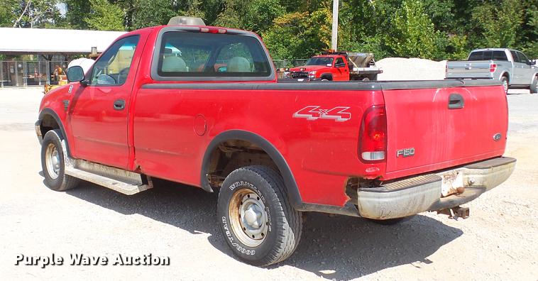 image for item DD7412 2000 Ford F150 flatbed pickup truck