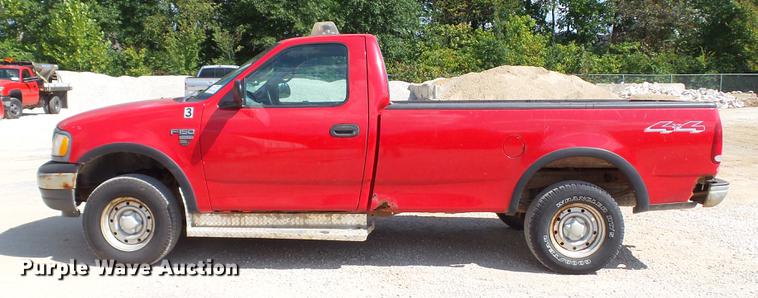 image for item DD7412 2000 Ford F150 flatbed pickup truck