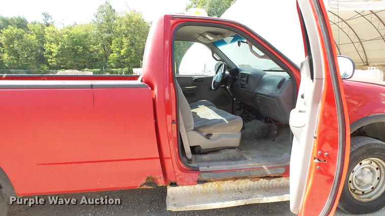 image for item DD7412 2000 Ford F150 flatbed pickup truck