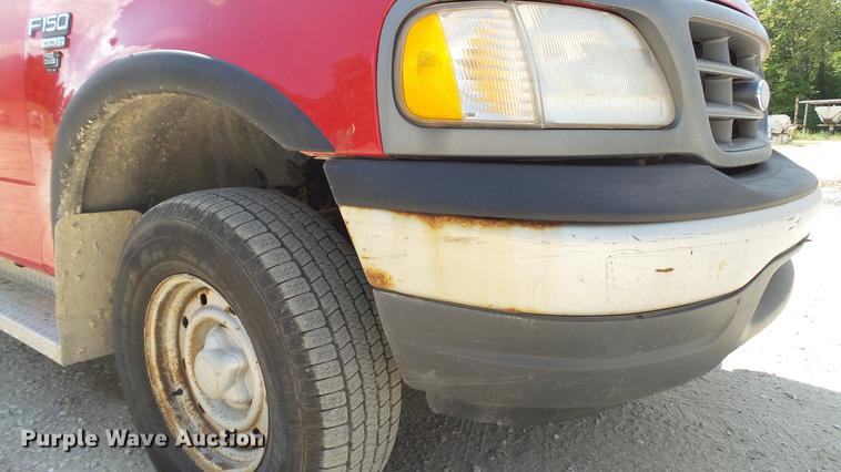 image for item DD7412 2000 Ford F150 flatbed pickup truck