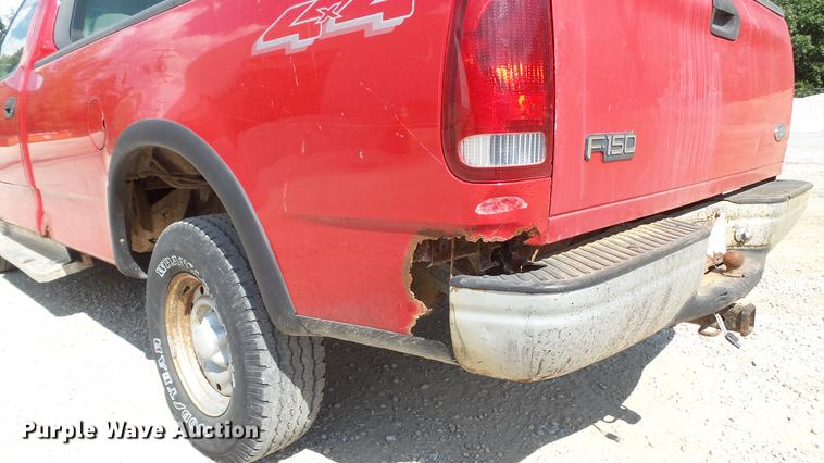 image for item DD7412 2000 Ford F150 flatbed pickup truck