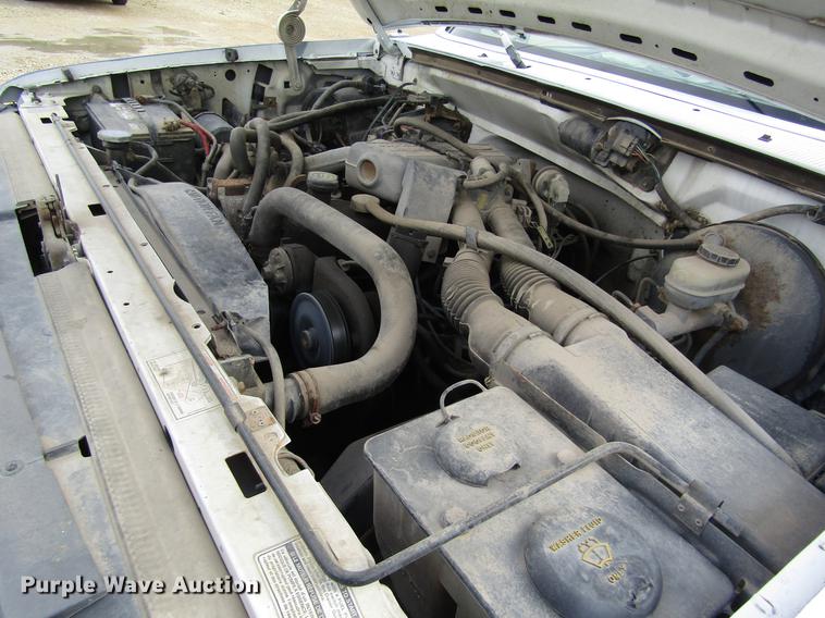 image for item DD8914 1993 Ford F150 utility bed pickup truck