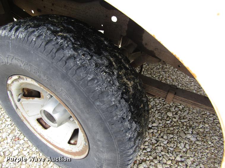 image for item DD8914 1993 Ford F150 utility bed pickup truck