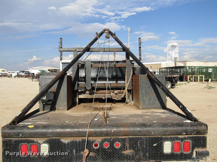 image for item DD4408 2014 Dodge Ram 5500 Crew Cab flatbed truck