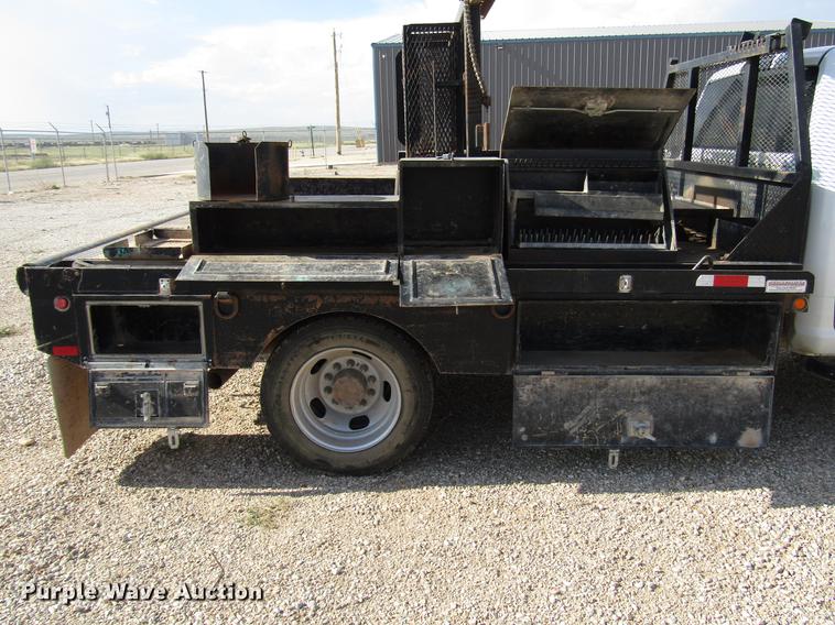 image for item DD4409 2014 Dodge Ram 5500 Crew Cab flatbed truck