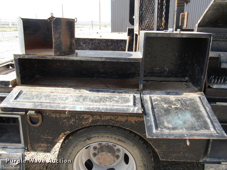 image for item DD4409 2014 Dodge Ram 5500 Crew Cab flatbed truck