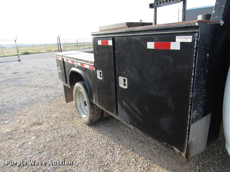 image for item DD4410 2014 Dodge Ram 5500 Crew Cab flatbed truck