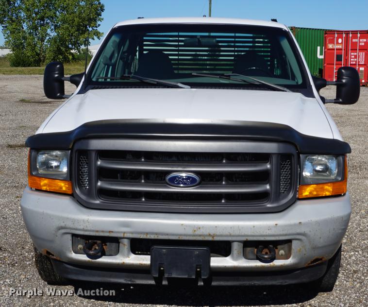image for item DD6636 2001 Ford F250 Super Duty SuperCab flatbed pickup truck
