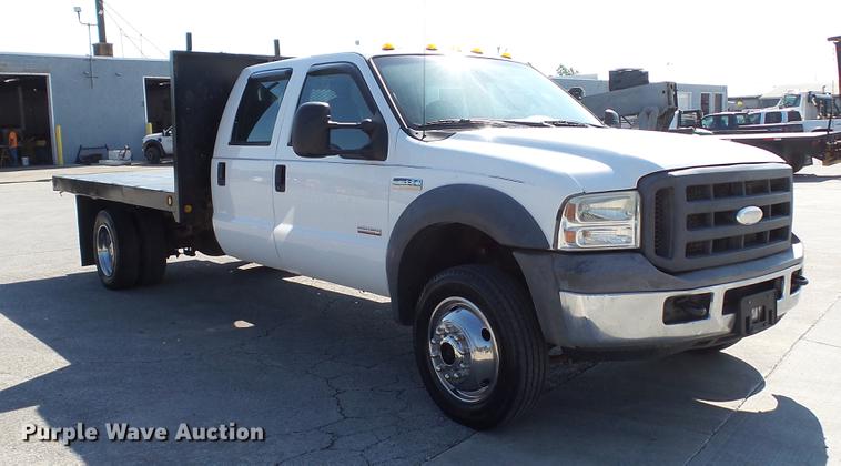 image for item DD7399 2005 Ford F550 Super Duty XL Crew Cab flatbed truck