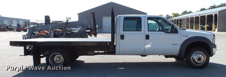 image for item DD7399 2005 Ford F550 Super Duty XL Crew Cab flatbed truck