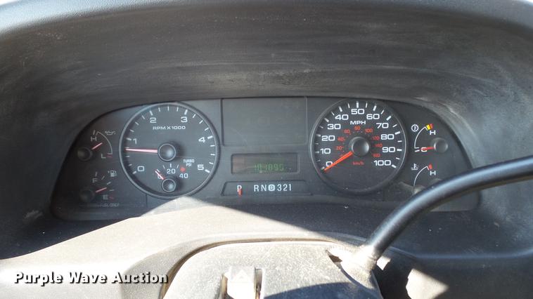 image for item DD7399 2005 Ford F550 Super Duty XL Crew Cab flatbed truck