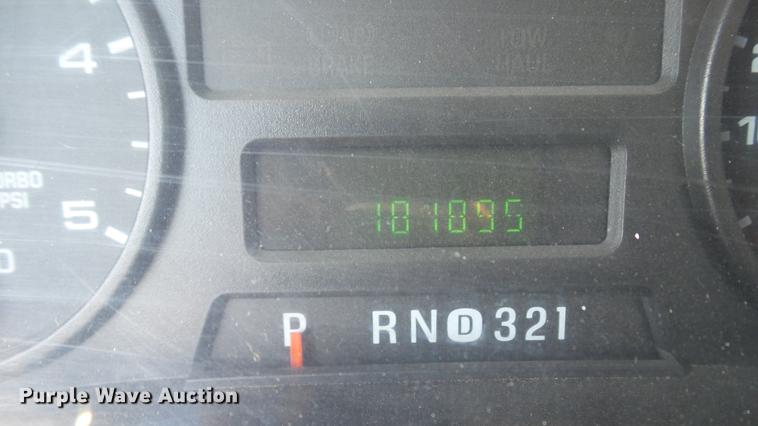 image for item DD7399 2005 Ford F550 Super Duty XL Crew Cab flatbed truck