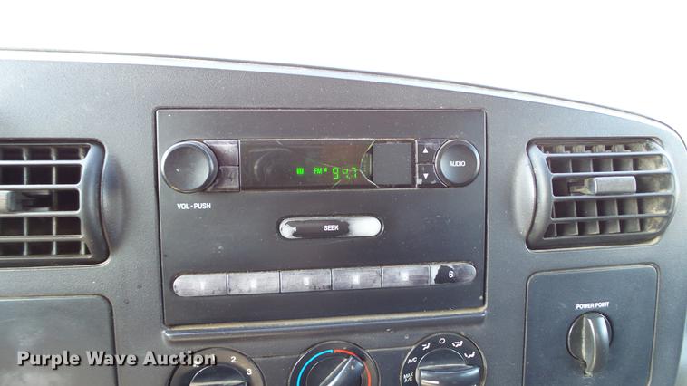 image for item DD7399 2005 Ford F550 Super Duty XL Crew Cab flatbed truck