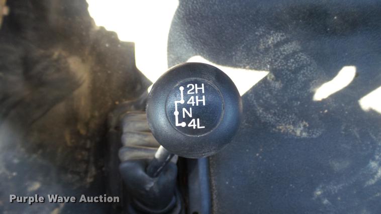 image for item DD7399 2005 Ford F550 Super Duty XL Crew Cab flatbed truck