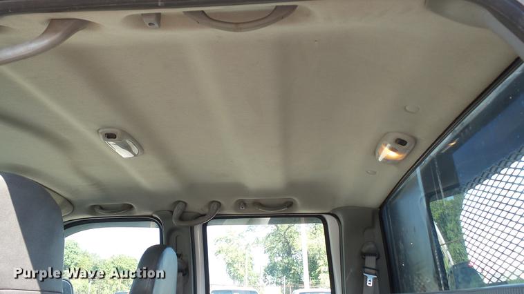 image for item DD7399 2005 Ford F550 Super Duty XL Crew Cab flatbed truck