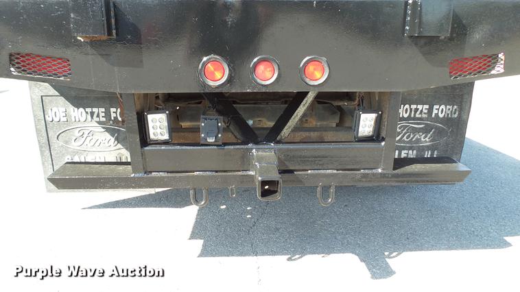 image for item DD7399 2005 Ford F550 Super Duty XL Crew Cab flatbed truck