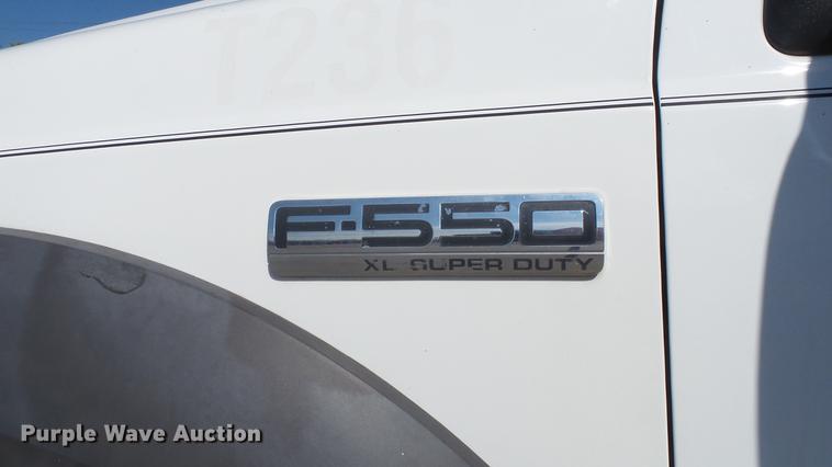 image for item DD7399 2005 Ford F550 Super Duty XL Crew Cab flatbed truck