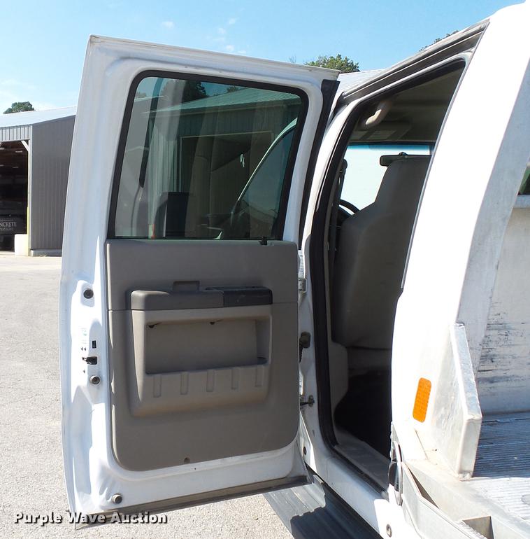 image for item DD7401 2008 Ford F450 Super Duty XL Crew Cab flatbed truck