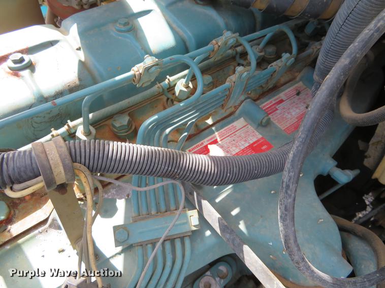 image for item DE6490 1994 International 4900 rollback truck