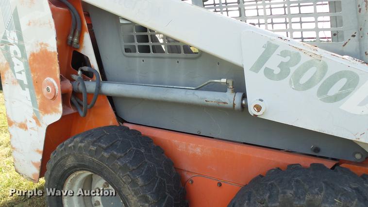 image for item DE4857 1999 Scat Trak 1300D skid steer