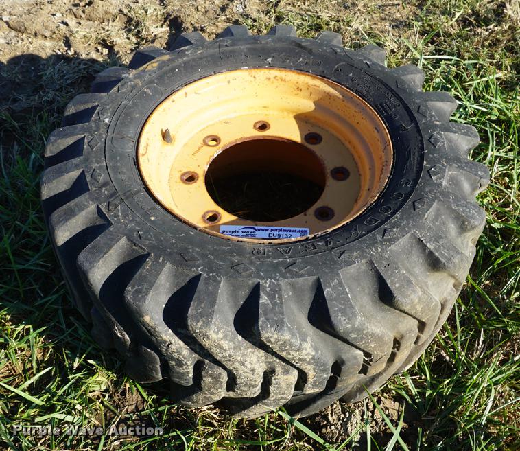 image for item EU9132 Goodyear 12-16.5 tires and wheel