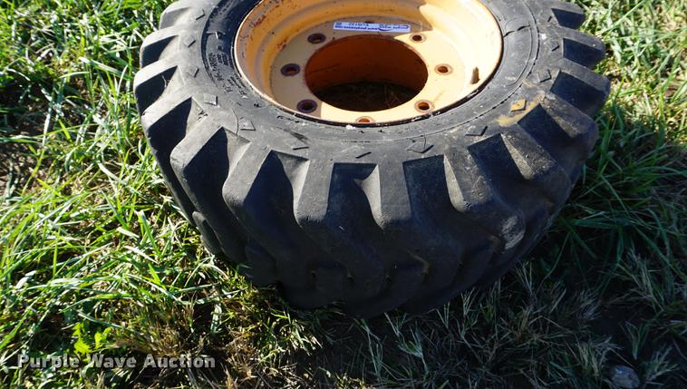 image for item EU9132 Goodyear 12-16.5 tires and wheel