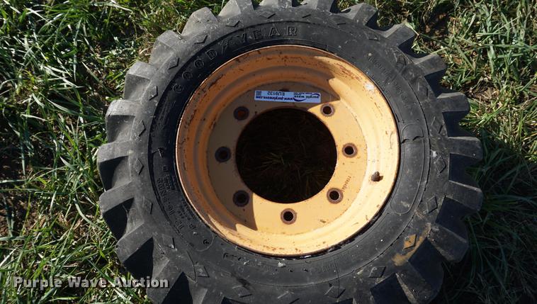 image for item EU9132 Goodyear 12-16.5 tires and wheel