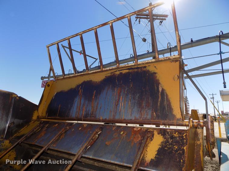 image for item DB8526 D-W hay hauler with Haybuster 256 bale processor