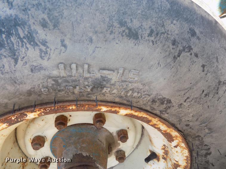 image for item DB8526 D-W hay hauler with Haybuster 256 bale processor