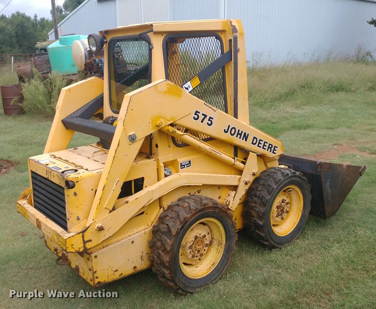 image for item G1348 1987 John Deere 575 skid steer