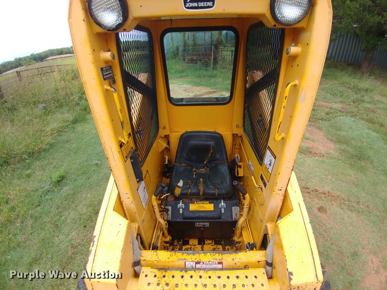 image for item G1348 1987 John Deere 575 skid steer