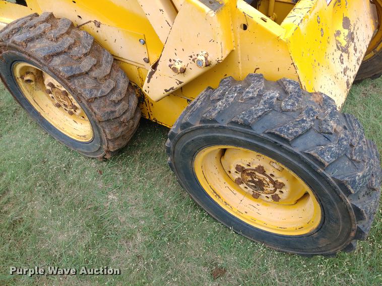 image for item G1348 1987 John Deere 575 skid steer