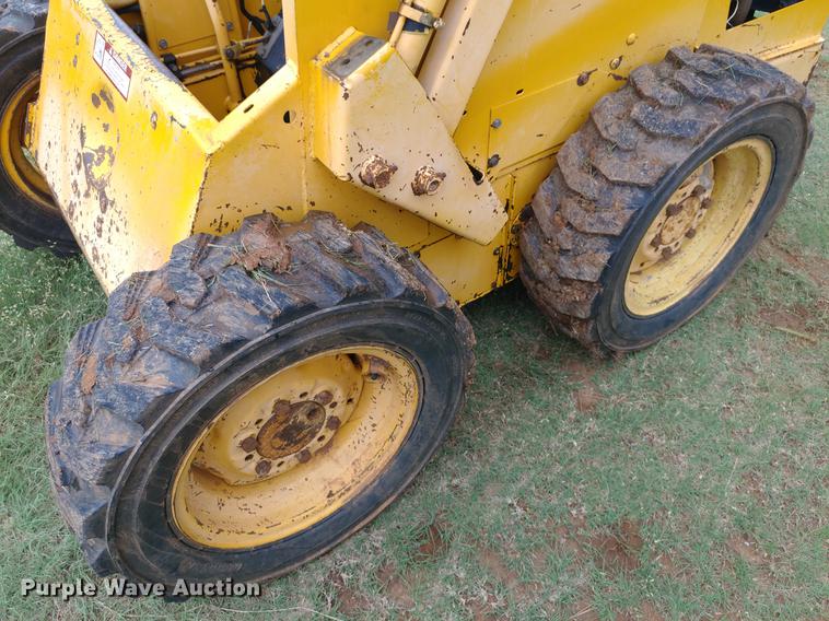 image for item G1348 1987 John Deere 575 skid steer