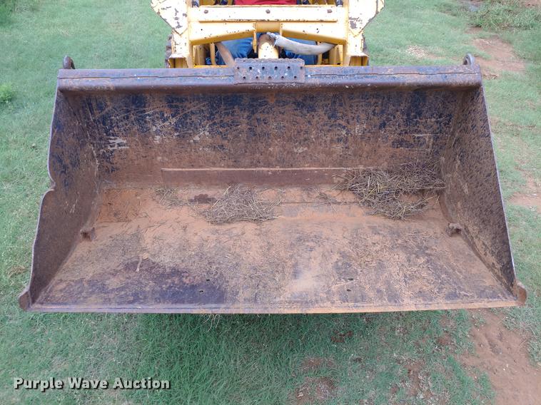 image for item G1348 1987 John Deere 575 skid steer