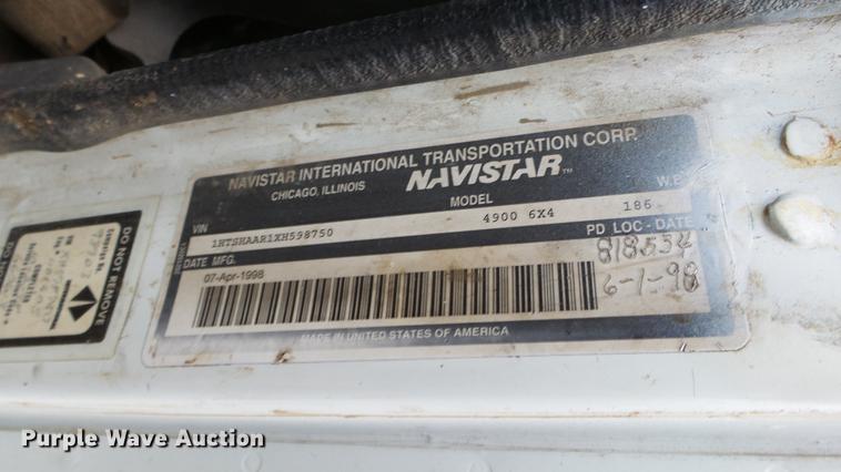 image for item AM9051 1999 International 4900 refuse truck