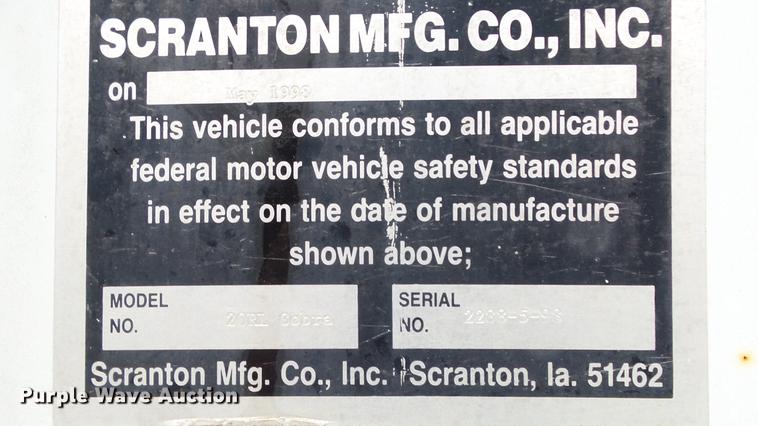 image for item AM9051 1999 International 4900 refuse truck