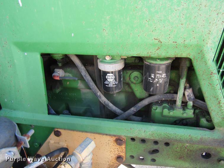 image for item DE4909 2000 John Deere 7210 tractor