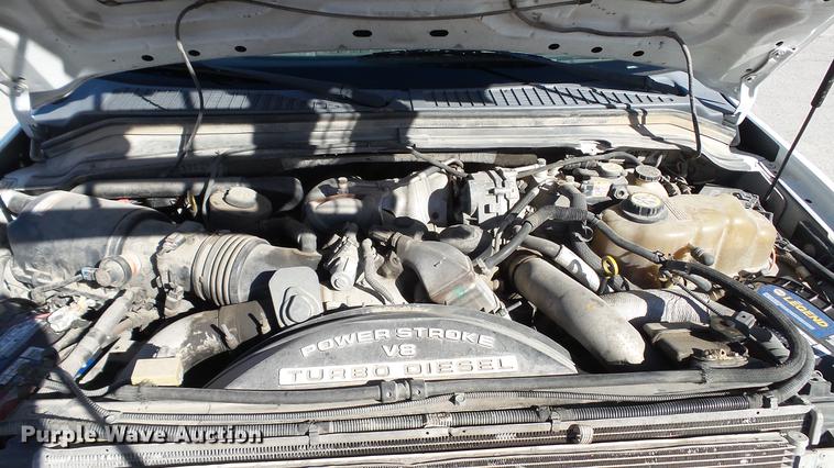 image for item DE4913 2008 Ford F250 Super Duty XL flatbed Crew Cab pickup truck