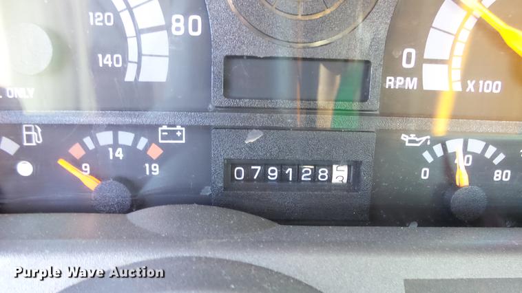 image for item DE7318 1997 GMC C7500 flatbed truck with fish transporter