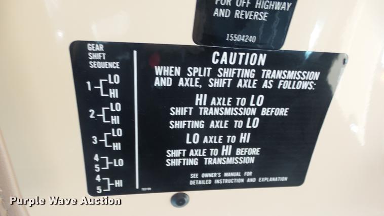 image for item DE7318 1997 GMC C7500 flatbed truck with fish transporter