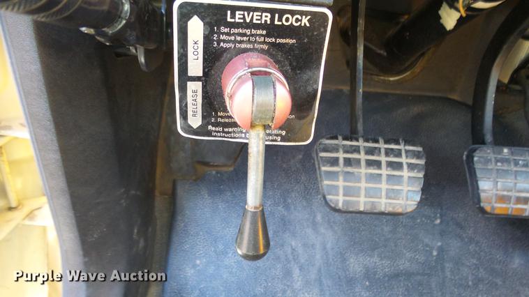 image for item DE7318 1997 GMC C7500 flatbed truck with fish transporter