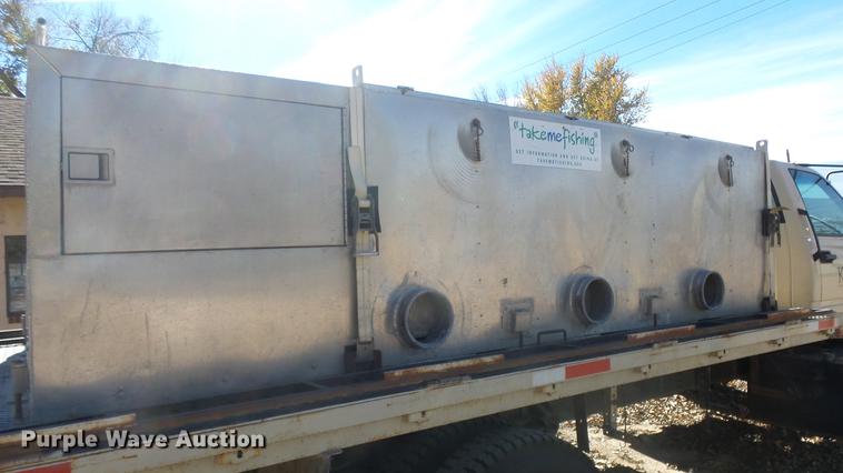 image for item DE7318 1997 GMC C7500 flatbed truck with fish transporter