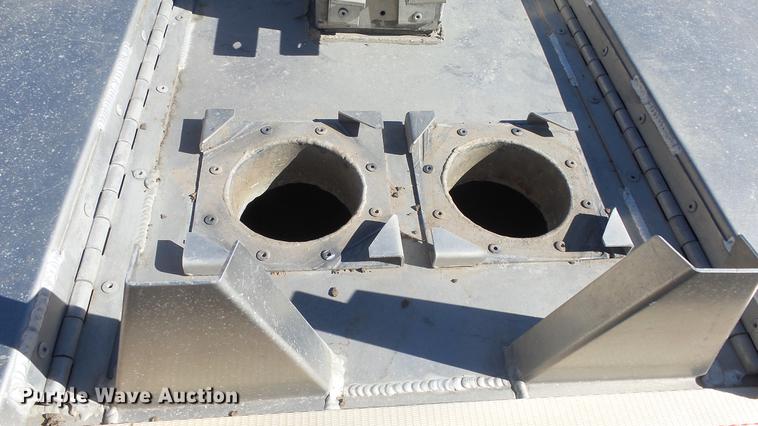 image for item DE7318 1997 GMC C7500 flatbed truck with fish transporter