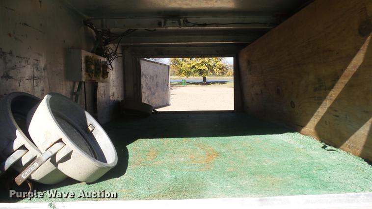 image for item DE7318 1997 GMC C7500 flatbed truck with fish transporter