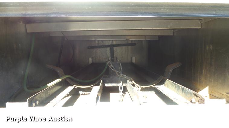 image for item DE7318 1997 GMC C7500 flatbed truck with fish transporter