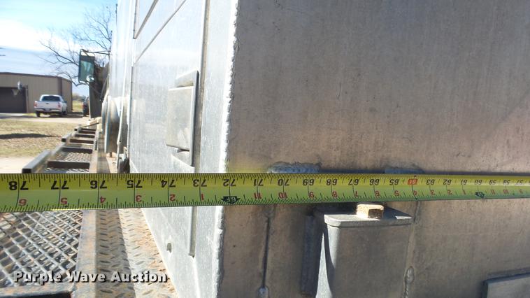 image for item DE7318 1997 GMC C7500 flatbed truck with fish transporter